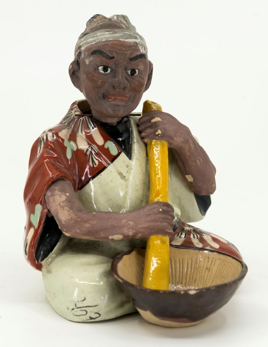 "Domácí seismograf - sedící muž s pohyblivou hlavičkou"