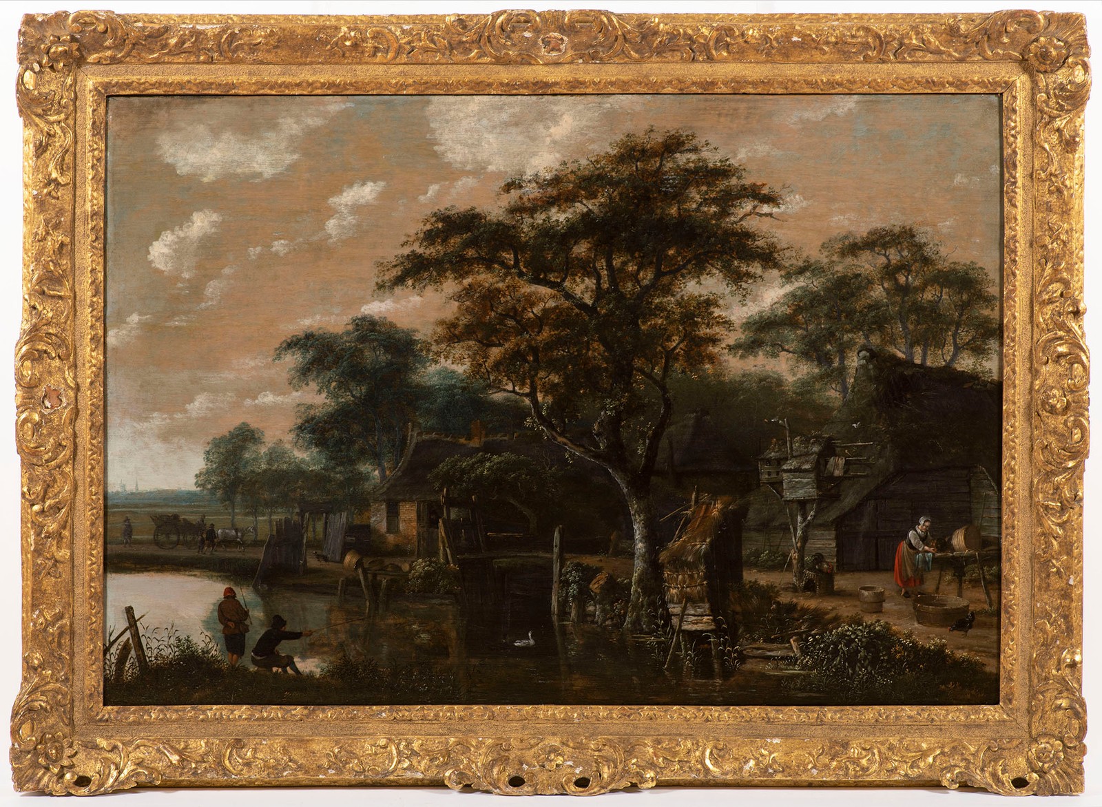 Haarlem master from the circle of Jacob van Ruisdael, Trees and Huts on the Bank of the Canal