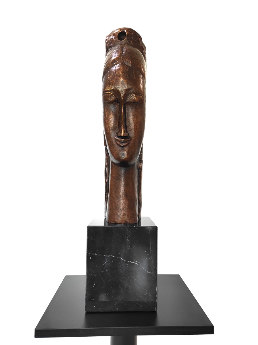 Amedeo Modigliani - Hlava mladé ženy