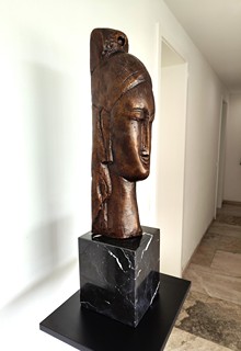 Amedeo Modigliani - Hlava mladé ženy