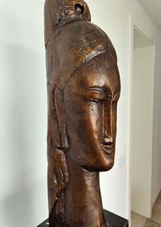 Amedeo Modigliani - Hlava mladé ženy