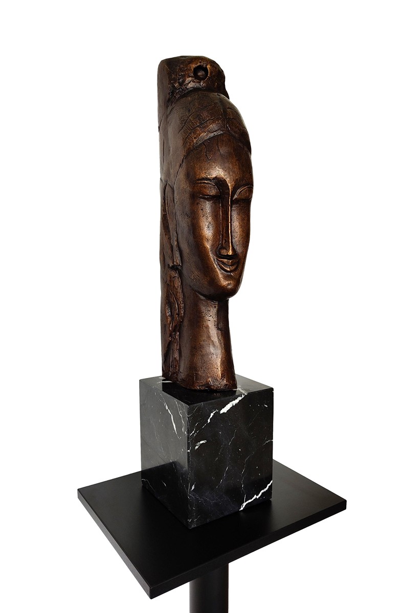 Amedeo Modigliani - Hlava mladé ženy