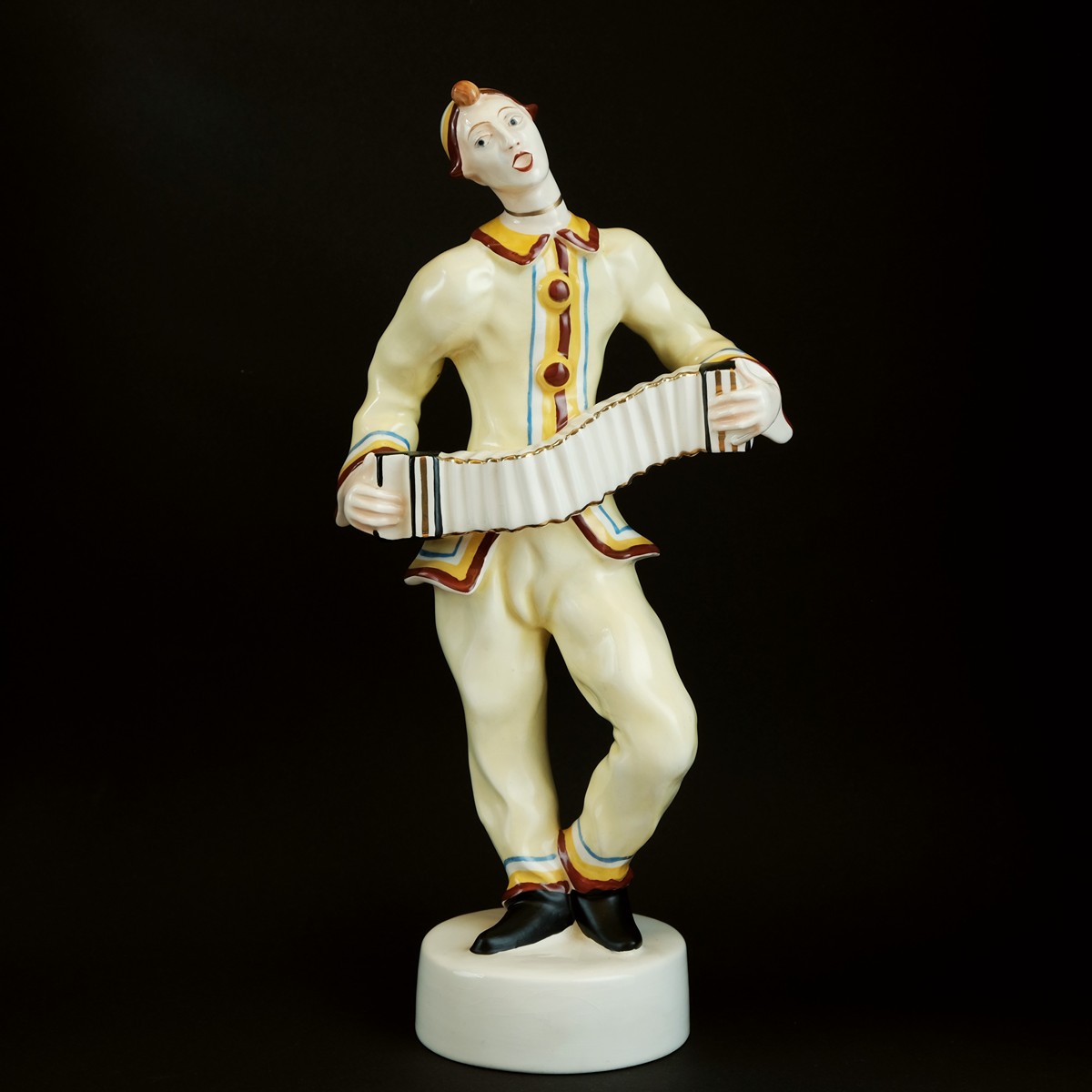 Harmonikář, Royal Dux