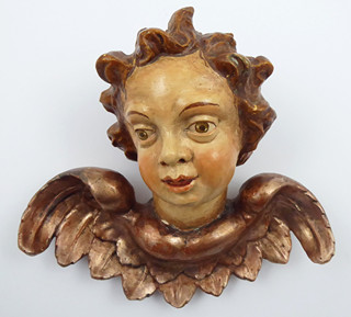 OKŘÍDLENÁ HLAVIČKA PUTTA