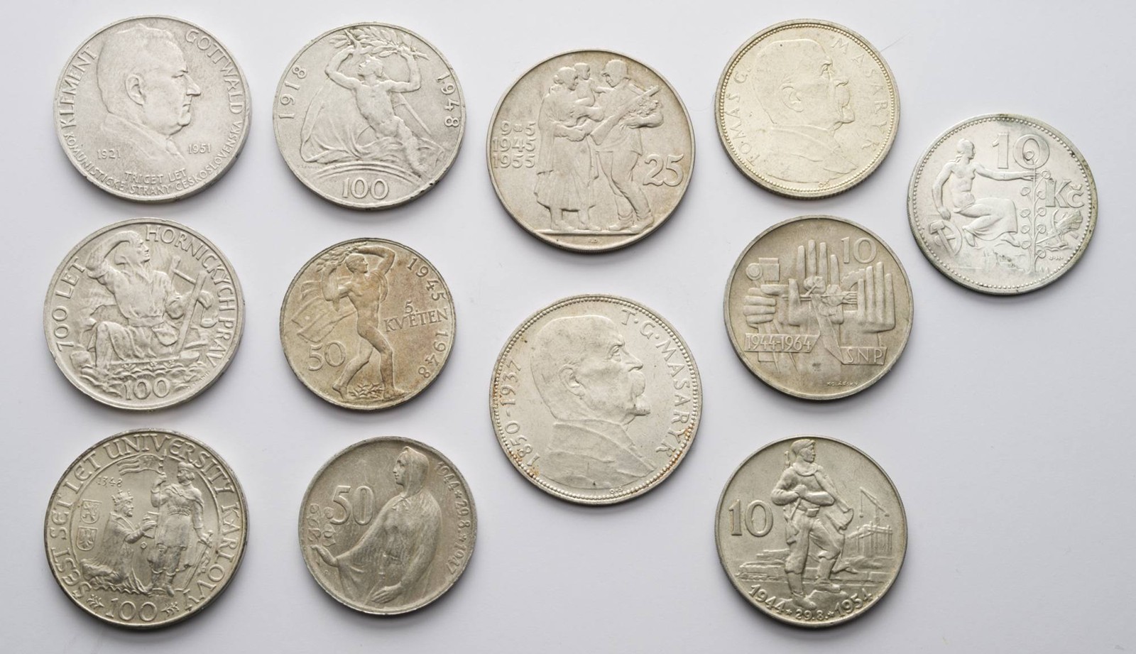 12 STŘÍBRNÝCH PAMĚTNÍCH MINCÍ