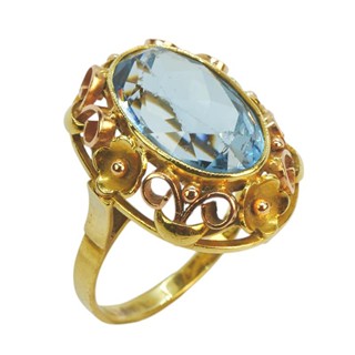 Zlatý prsten s kytičkami a modrým spinelem