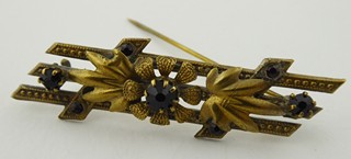 BROŽ S KVĚTEM A SKLENĚNÝMI GRANÁTKY