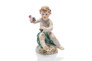 Porcelánová figurka putta s květinami | Staatliche Porzellan-Manufaktur Meissen (Míšeň, Německo)