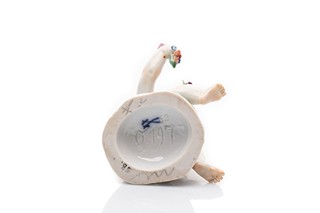 Porcelánová figurka putta s květinami | Staatliche Porzellan-Manufaktur Meissen (Míšeň, Německo)