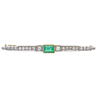Art deco zlatá brož s přírodním smaragdem a diamanty