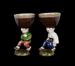 PAIR OF FIGURAL CUPS (SALT CELLARS)