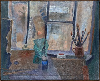 By the window in the studio