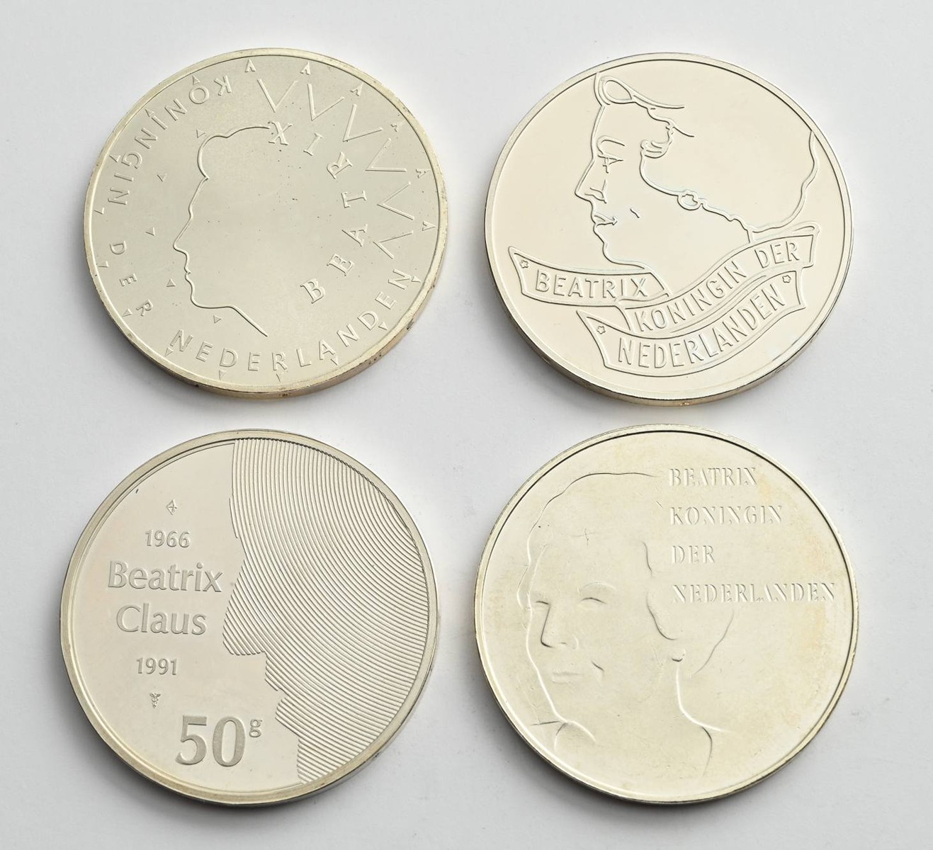 ČTYŘI STŘÍBRNÉ PAMĚTNÍ MINCE 50 GULDEN