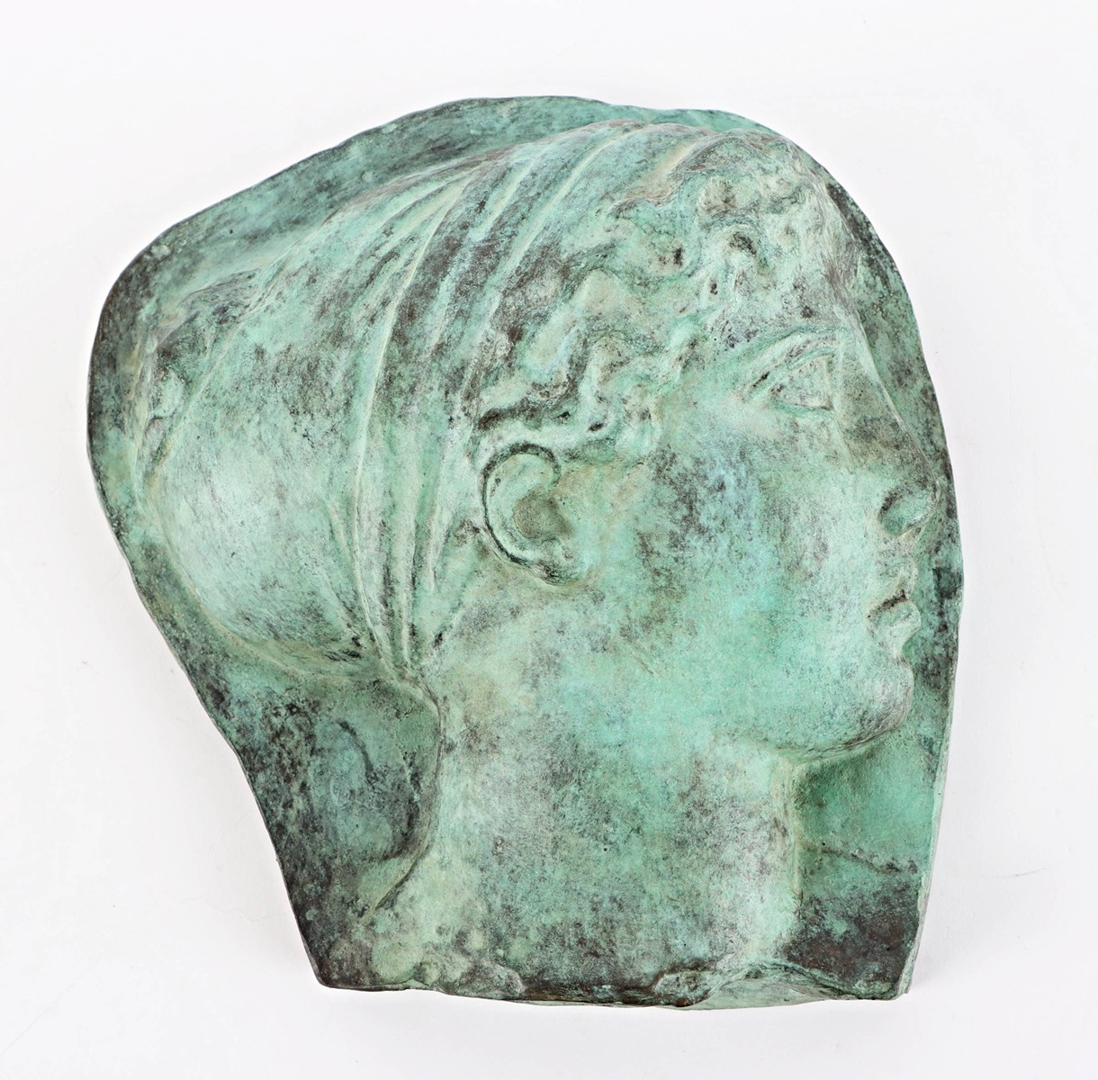 Bronzový reliéf – hlava bohyně Artemis