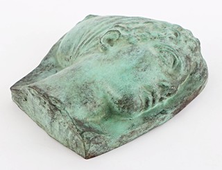 Bronzový reliéf – hlava bohyně Artemis