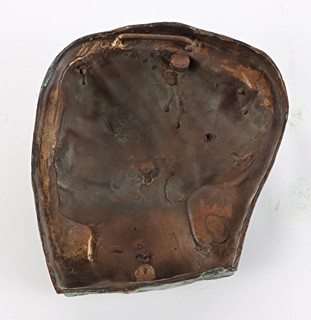 Bronzový reliéf – hlava bohyně Artemis