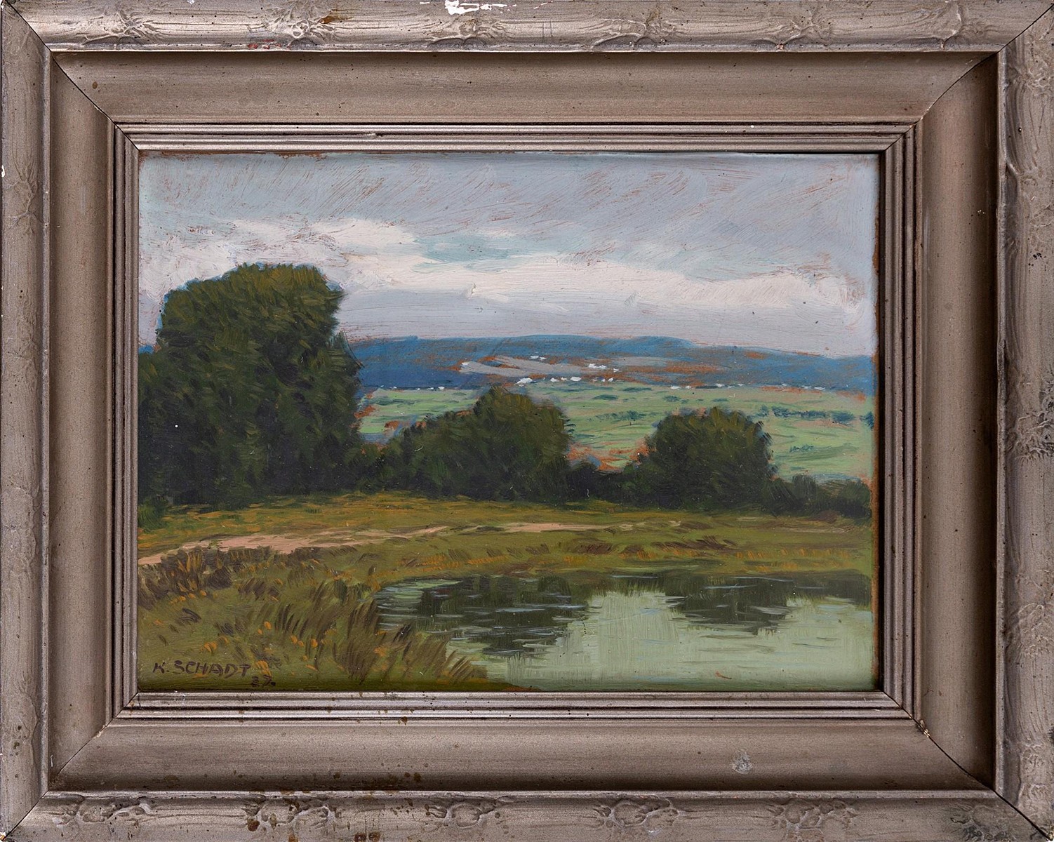 Landscape with a pond
