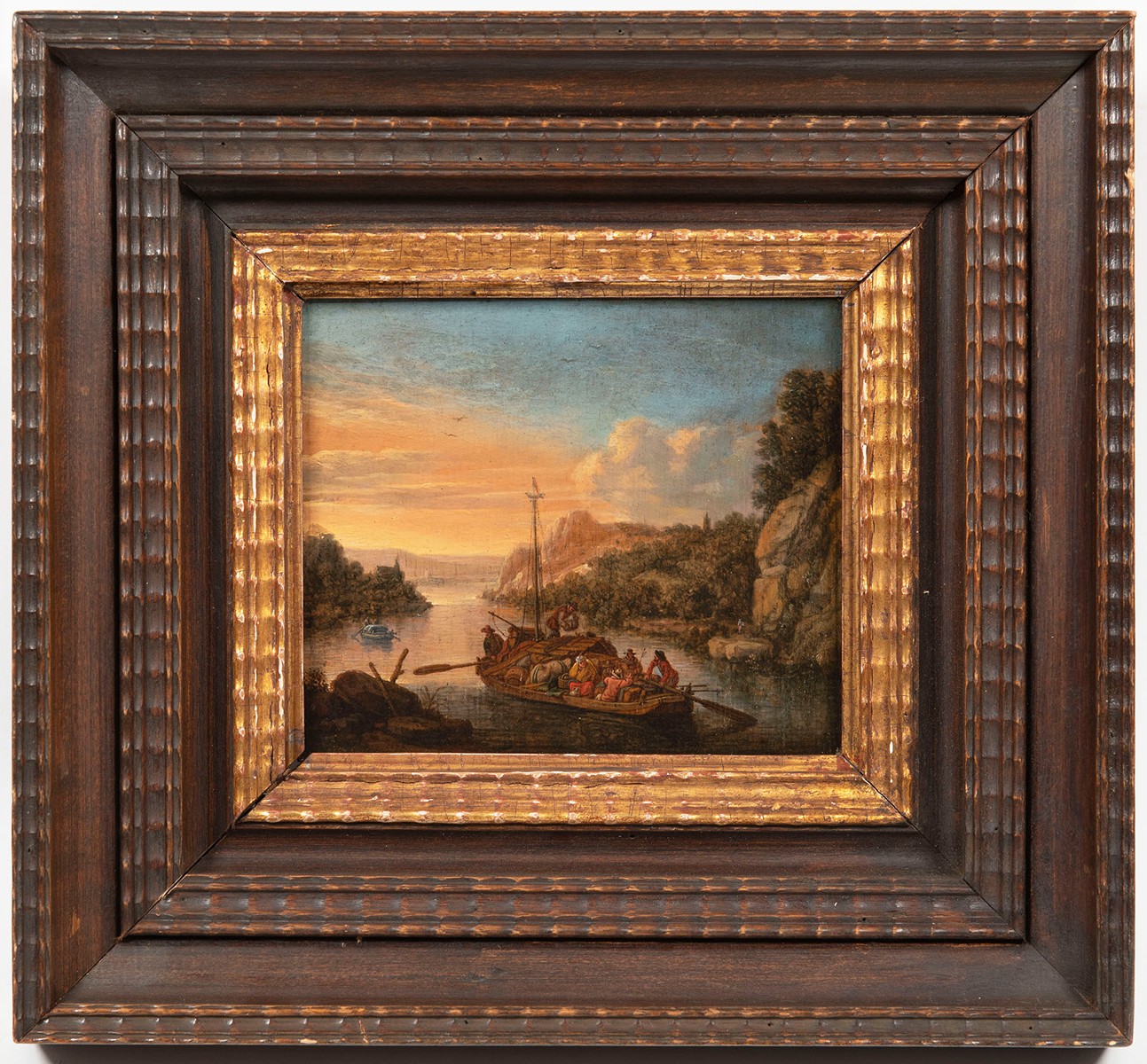 River Landscape with a Laden Rowboat in a Cove