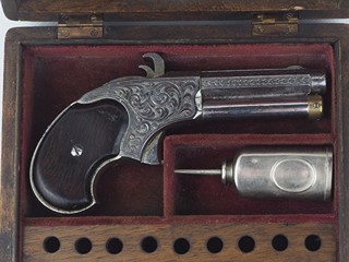 Opakovací pistole Remington Rider v kazetě