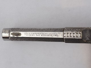 Opakovací pistole Remington Rider v kazetě