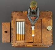 Dóza s podavačem cigaret - figurkou s EXPRES kšiltovkou