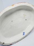 Porcelánová soška chlapci s dělem