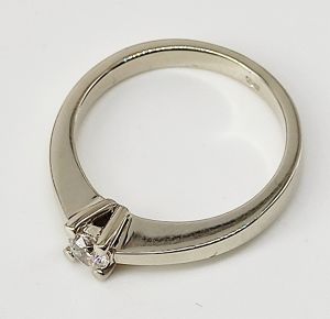 Zlatý prsten solitér s diamantem 0,233 c