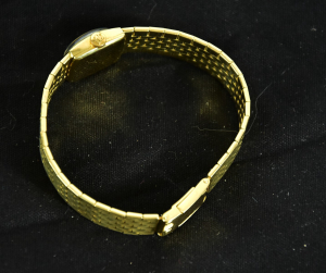 Dámské zlaté náramkové hodinky Tissot