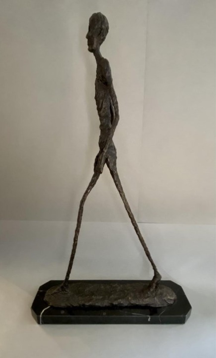 Giacometti Alberto - Kráčející muž